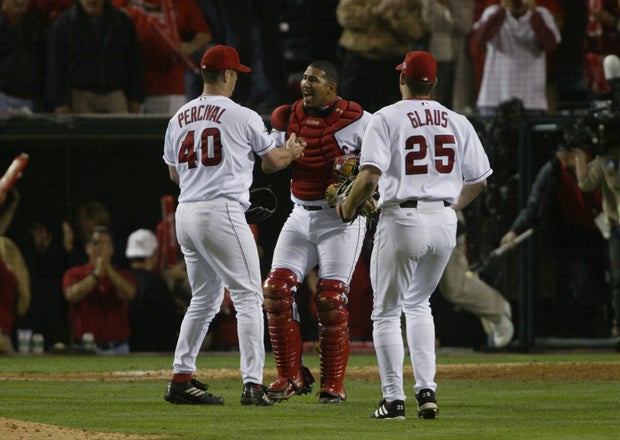 Jose Molina celebrates winning game six