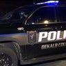 DeKalb police officer shot in vest after responding to hostage call; woman wounded 