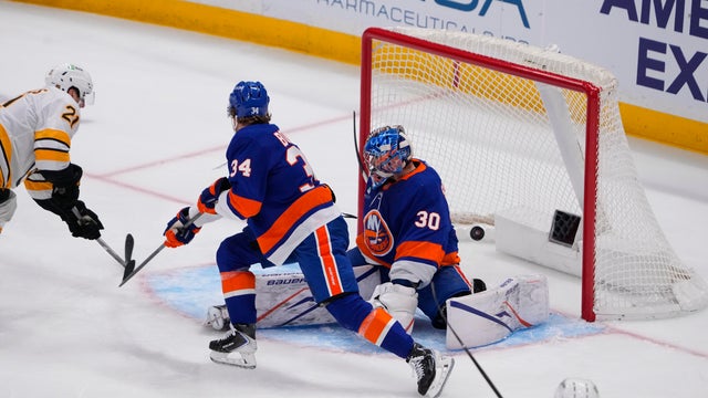 Boston Bruins Center Alex Steeves (21) scores a goal on New York Islanders Goalie Ilya Sorokin (30) during the first period of the National Hockey League on November 26, 2025, at UBS Arena in Elmont, NY. 