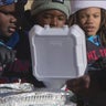 2 Little League football teams help feed the unhoused for Thanksgiving on West side 