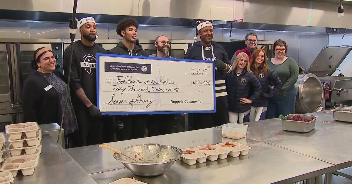 Denver Nuggets present Food Bank of the Rockies with $50,000 check