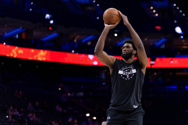 Philadelphia 76ers' Joel Embiid shoots some warm up shots prior to an NBA basketball game against the Atlanta Hawks
