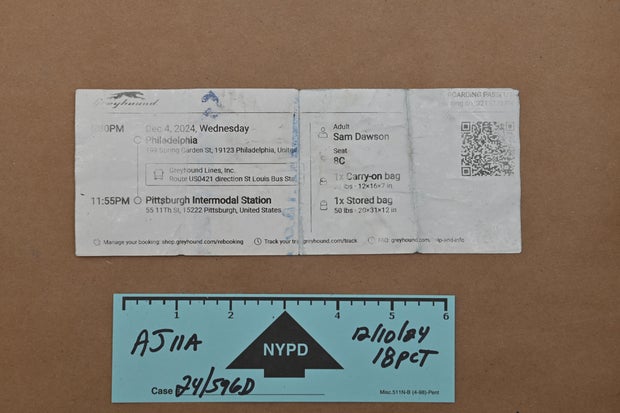 A Greyhound ticket from Philadelphia to Pittsburgh that authorities say was found on Luigi Mangione when he was arrested.