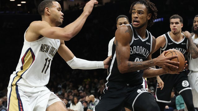 Nic Claxton #33 of the Brooklyn Nets defends the ball from Bryce McGowens #11 of the New Orleans Pelicans during the fourth quarter at Barclays Center on December 06, 2025 in the Brooklyn borough of New York City. 