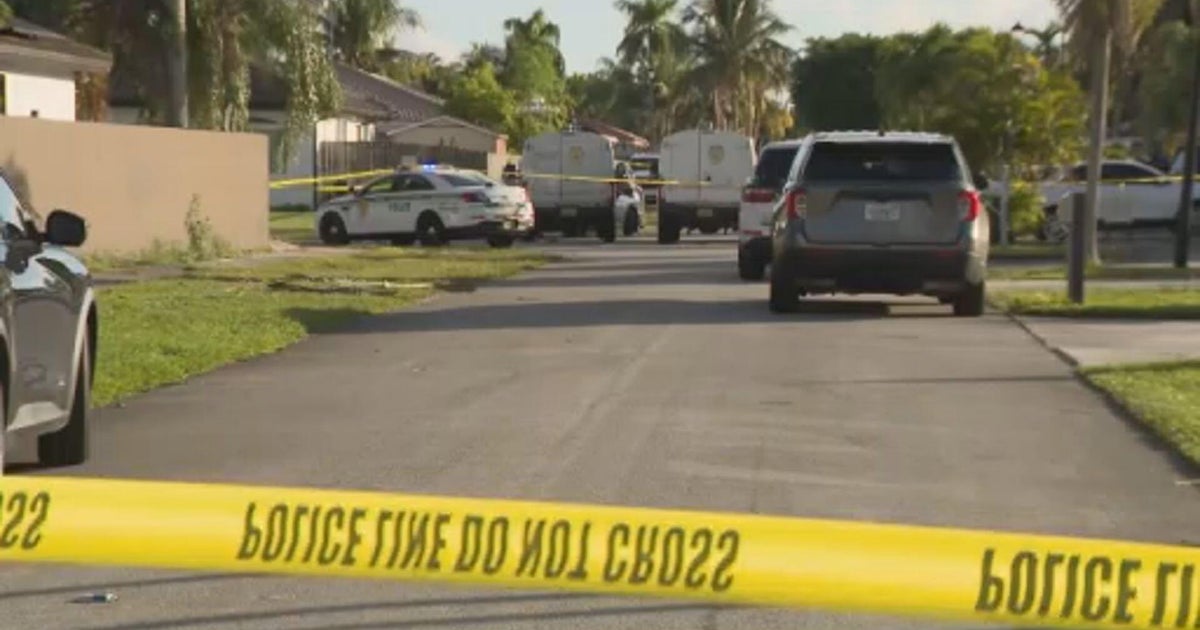 Man and woman found shot to death just south of Country Walk, deputies say