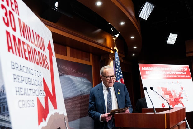 Senate Minority Leader Chuck Schumer arrives for the Senate Democrats' news conference on extending expiring Affordable Care Act tax credits in the U.S. Capitol on Dec. 4, 2025. 