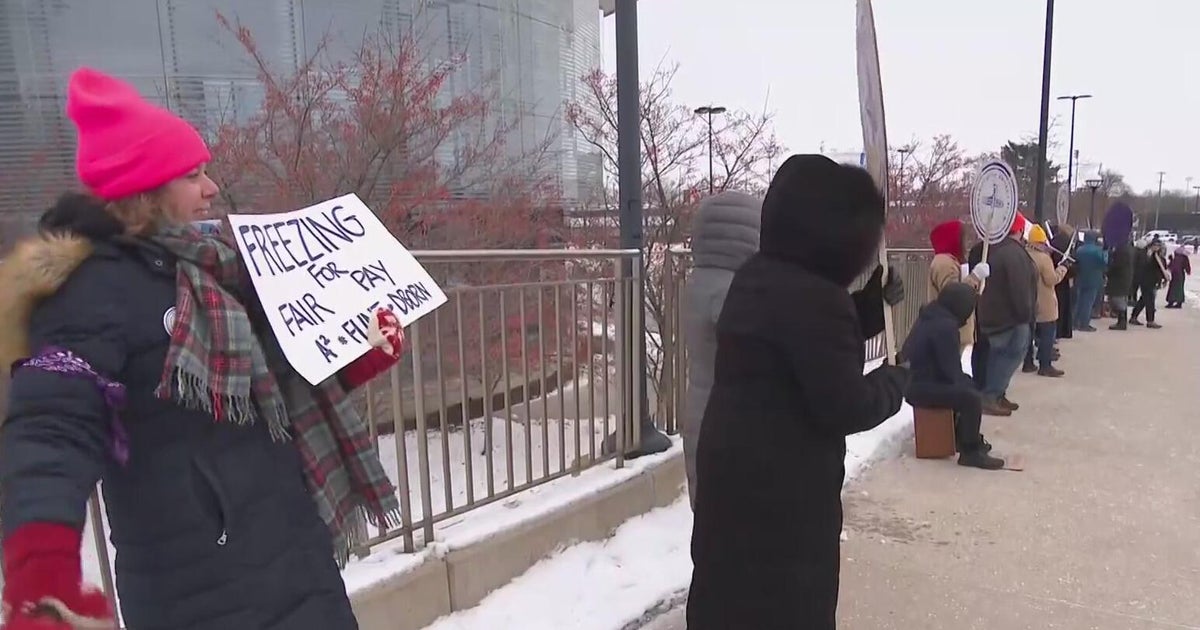 University of Michigan staff members picket over wages