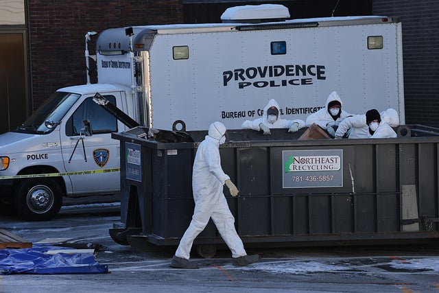 Providence Police search in a dumpster on the Brown University campus