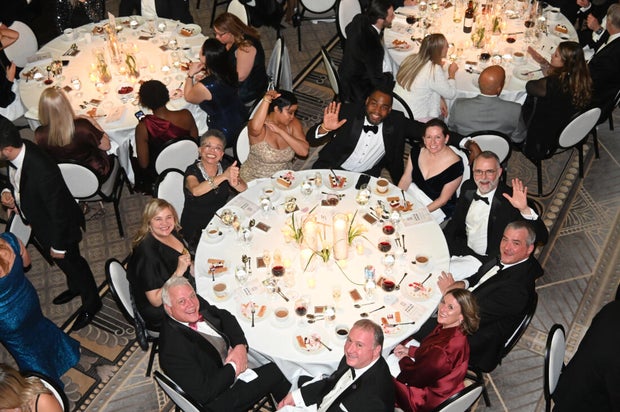 People pose for photos at the 2025 Pennsylvania Society Dinner