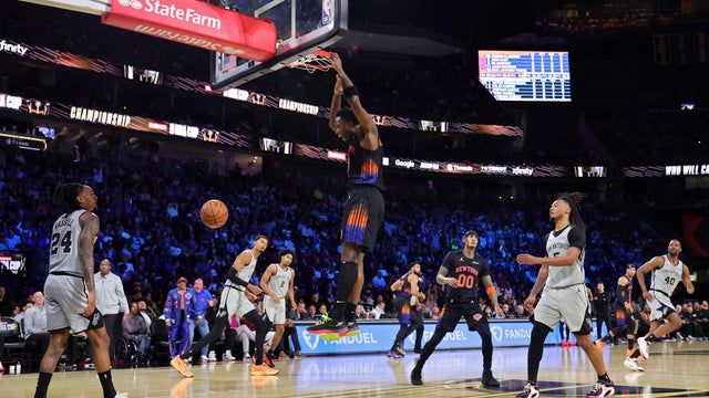 OG Anunoby #8 of the New York Knicks dunks the ball during the first quarter against the San Antonio Spurs in the Emirates NBA Cup Championship game at T-Mobile Arena on December 16, 2025 in Las Vegas, Nevada. 
