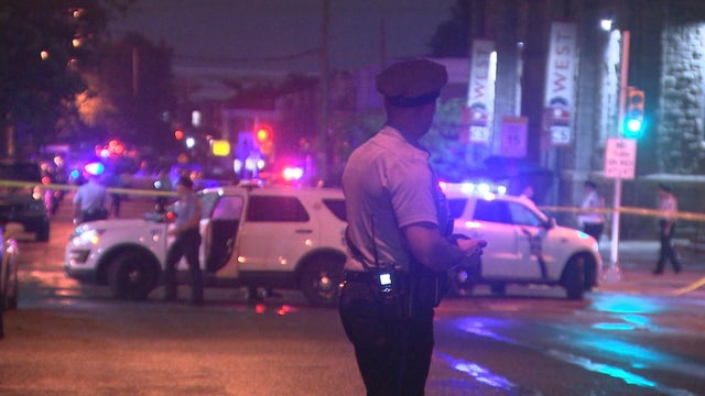 A photo of police at the scene of the shooting 
