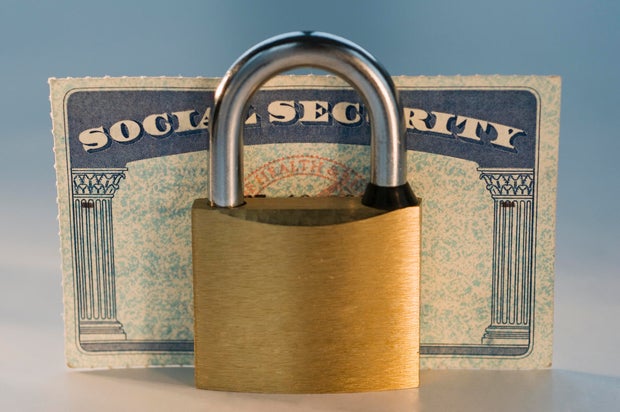 Close up of lock and social security card 