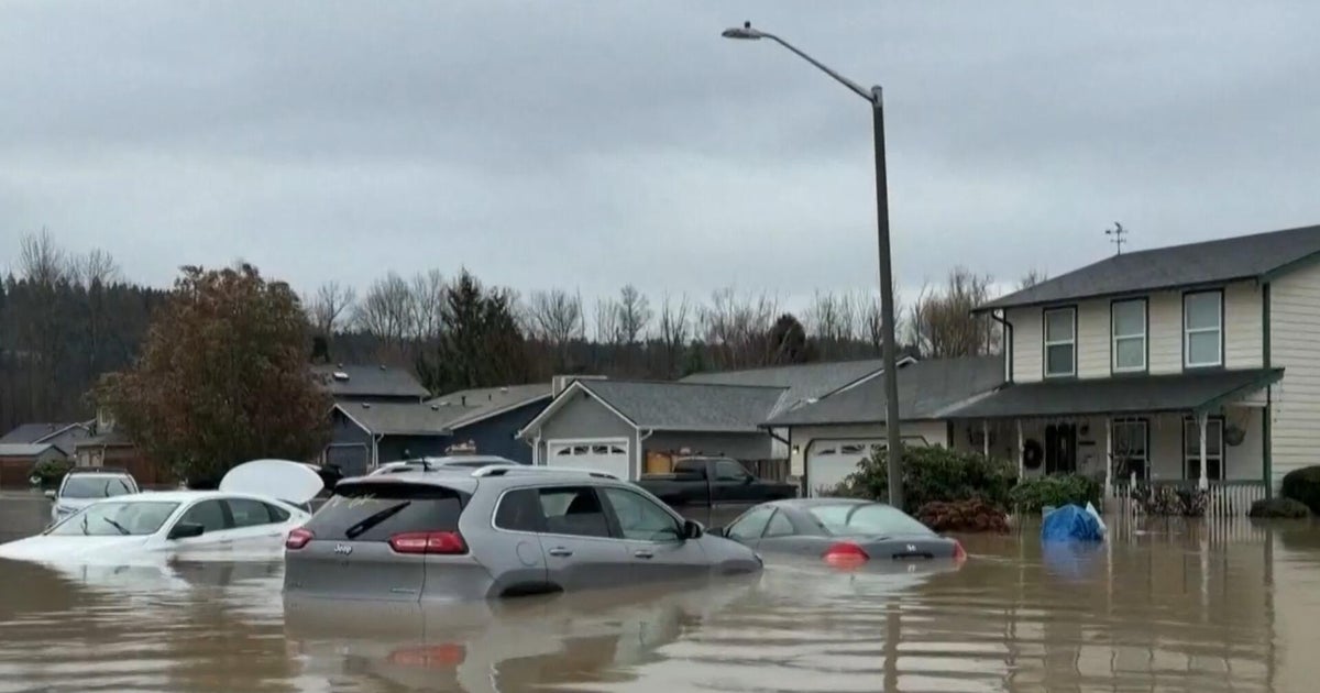 Levee failure along Washington river forces evacuations as entire neighborhoods are flooded