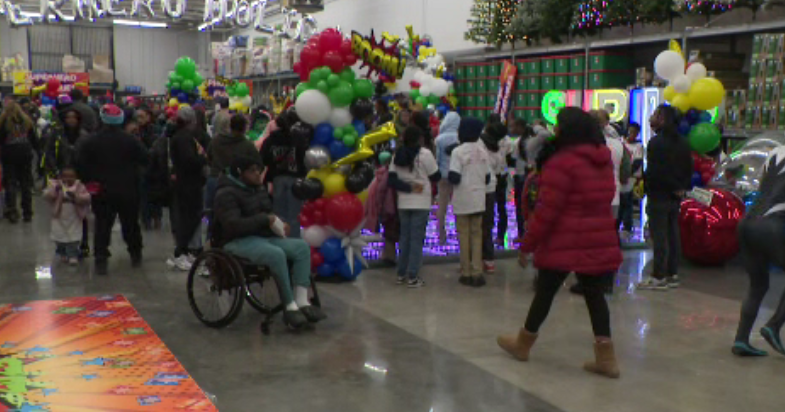 7th annual Shrimp and Gifts event give Baltimore children a joyous Christmas
