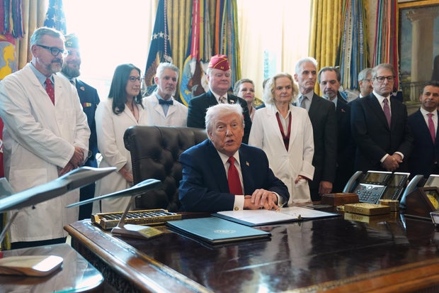 President Trump speaks during an executive order signing in the Oval Office of the White House, Thursday, Dec. 18, 2025, in Washington.