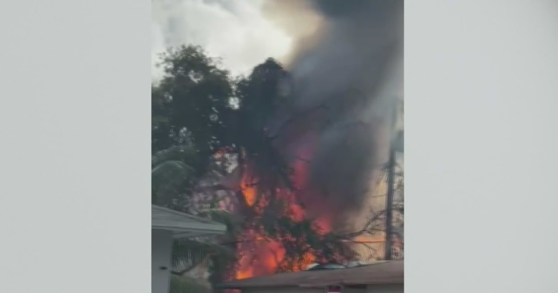 Backyard fire at Miami duplex displaces family, knocks out power to dozens