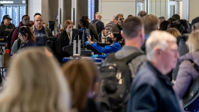 Travelers At SFO Airport Ahead Of Thanksgiving Holiday 