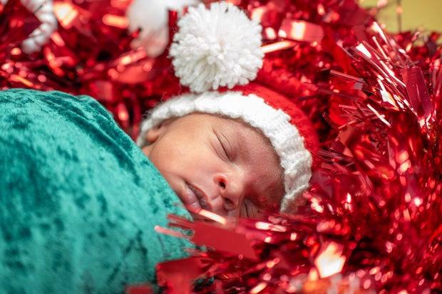 The babies at Henry Ford Hospital's Neonatal Intensive Care Unit received a visit from Santa Claus on Christmas Eve. 