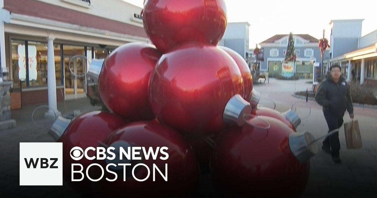 Holiday shoppers hit the Wrentham Outlets on Christmas Eve
