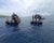 Rescuers search for soccer coach, children after boat sinks in Indonesia