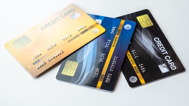 Close up of a set of cradit cards isolated on white table. 