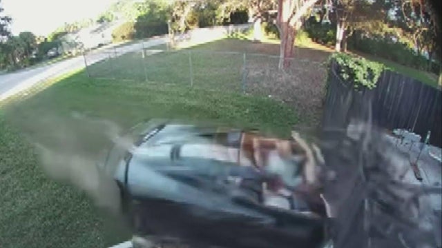 Corvette slams into Palmetto Bay home 