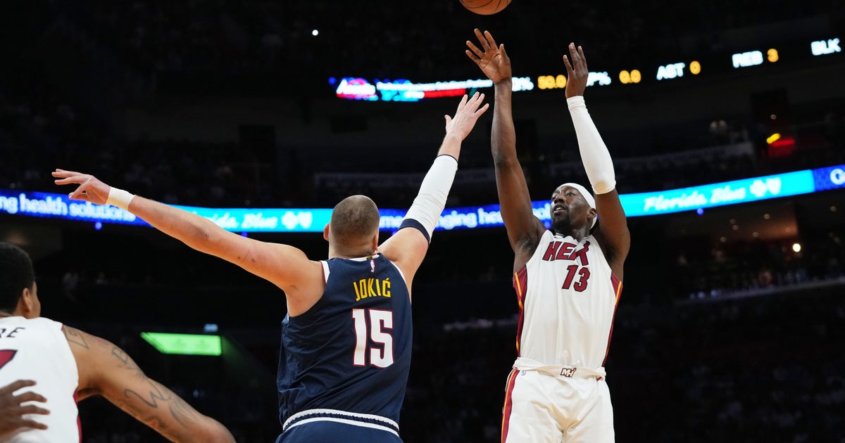 Jokic gets hurt late in 1st half, Heat pull away from there to top Nuggets