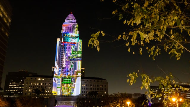 A preview of Gloria Molina Grand Park's New Years Eve LA Midnight Countdown to 2025 by creative agency A3 Visual, projects a dazzling two-minute preview of the park's signature countdown-to-midnight art show spectacle on the west fa&ccedil;ade of the 22-story L. 