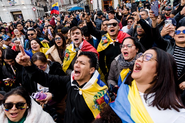 Dozens Of Venezuelans Take To The Streets Of Madrid To Celebrate The "fall Of Maduro's Regime". 
