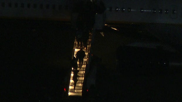People exiting a plane 