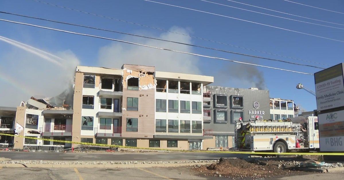 Denver firefighters continue efforts to extinguish blaze at apartment ...