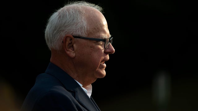 Minnesota Gov. Tim Walz speaks to media gathered on the first day of school at Deerwood Elementary on September 2, 2025 in Eagan, Minnesota. 
