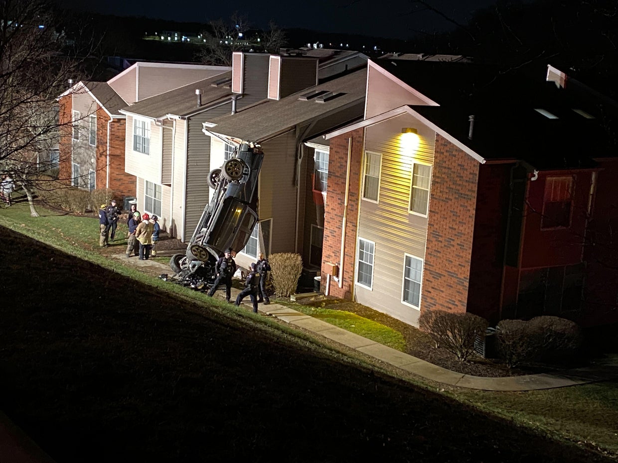 Truck lands upright, slams into Robinson Township apartment building ...