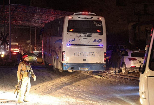 Kurdish fighters evacuate Aleppo after days of violent clashes with Syrian forces