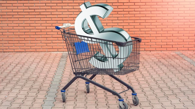 Dollar sign in shopping cart 