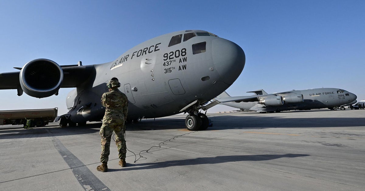 U.S. reduces some personnel at Qatar airbase as Trump threatens action in Iran