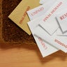 Envelopes and Bills on the Doormat 
