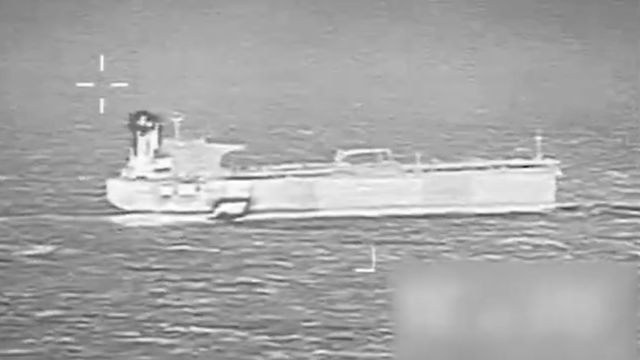 In this photo illustration, an American flag and a 