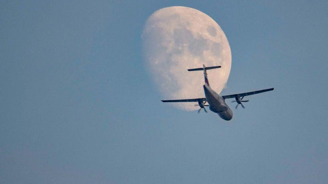 Aircraft Passing In Front Of The Moon 