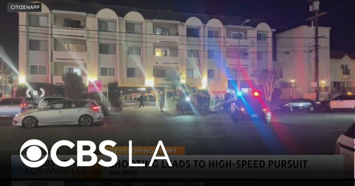 Two in custody following a shooting outside a Van Nuys apartment complex
