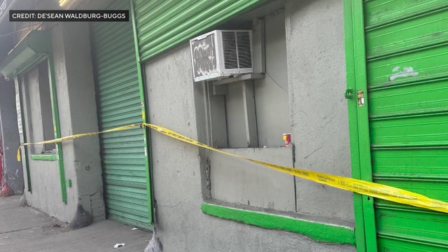 Crime scene tape outside a Brooklyn automotive shop 