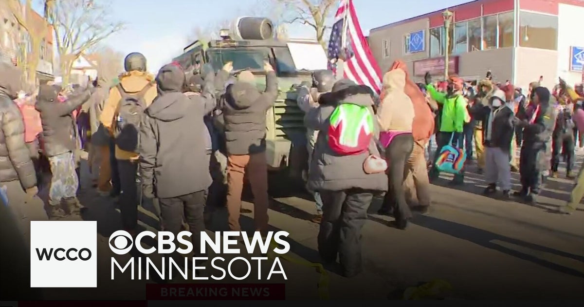 Large armored vehicle appears to drive through protesters in south Minneapolis