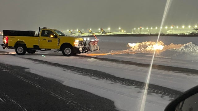 Crews clear the runways at Philadelphia International Airport 