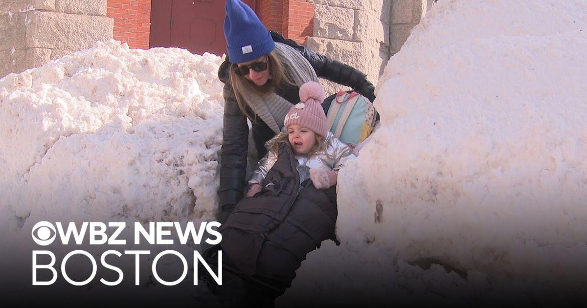 Snow piles make walking difficult in Boston after storm - CBS Boston