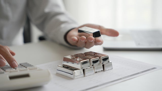 Silver Trading Businessman invest in trading silver on the stock exchange&nbsp;price rising. 