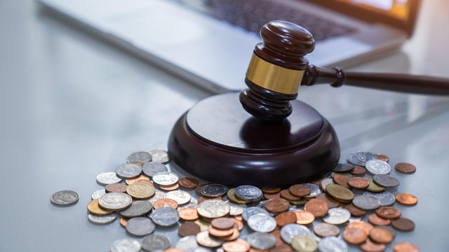 Judge's gavel  and money, financial law 