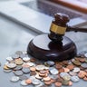Judge's gavel  and money, financial law 