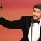 Bad Bunny wins Album of the Year at Grammys as he and other stars protest ICE