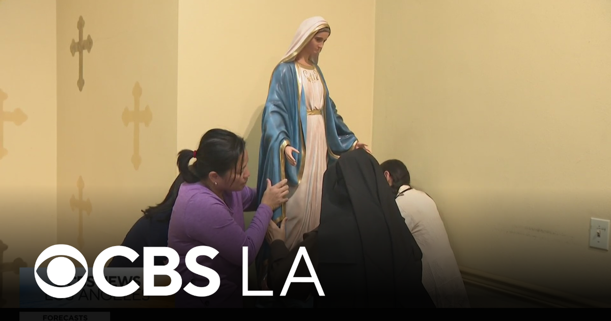 As investigation continues, volunteers help clean and restore vandalized Long Beach Catholic school