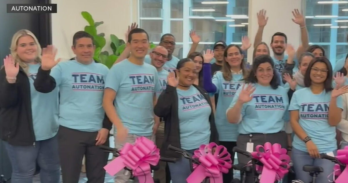 AutoNation employees build bikes for kids battling cancer ahead of Dolphins Cancer Challenge